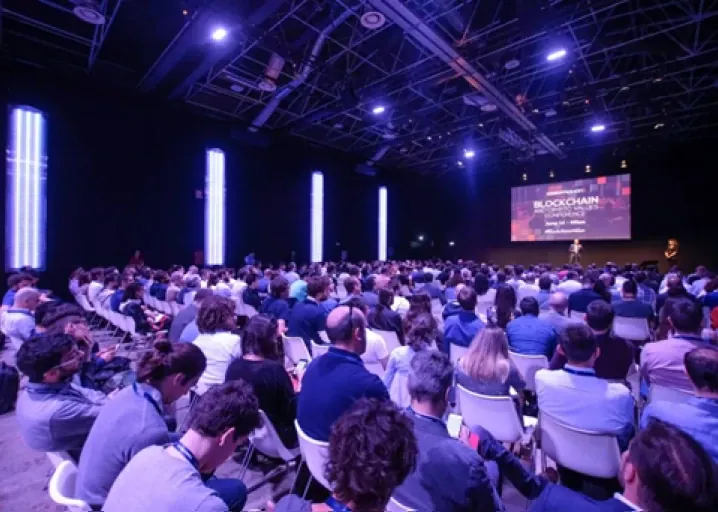 A packed audience at a technology conference